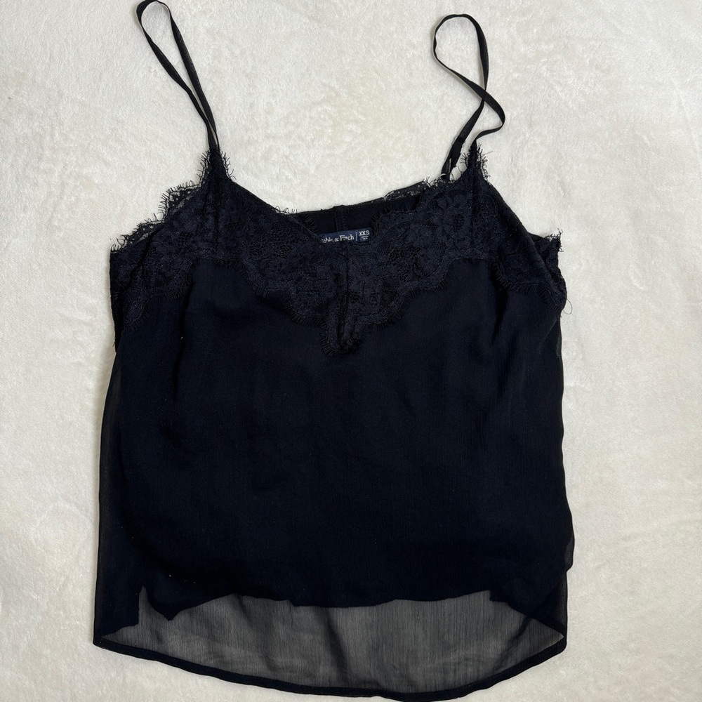 Super pretty  Abercrombie black lace camisole size xxs but loose and flattering
